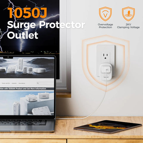 Go To 1050J Surge Protector With Protected Light Indicator, 1875W Max Single Outlet Wall Plug installed near a laptop.
