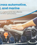 Person using Heavy Duty Oil Absorbent Pads Suck Up Grease And Fuel Like A Champ, Tear Resistant mat for automotive cleanup.