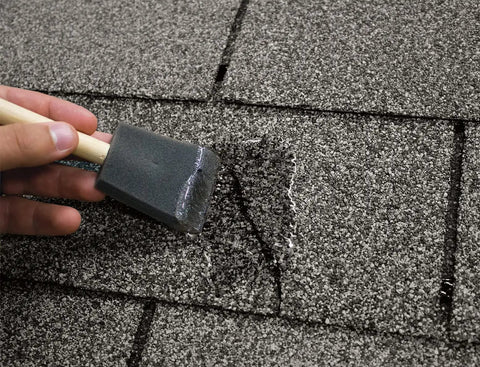 Application of Clear Roof Sealant That Actually Seals Leaks Forever, Ultra Elastic Roof Patch Caulk on roof shingles.