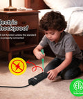 Child playing with Intertek listed power strip on bedroom floor, demonstrating electric shockproof safety