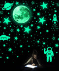 Glow In The Dark Stars And Planets Ceiling Wall Decor Kit With Rockets And Astronauts For A Galaxy Themed Kids Room Or Nursery Bedroom Totally Kid Friendly 1078 Piece Starry Sky Sticker Set glowing in a child's room