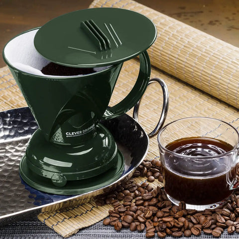Pour Over Coffee Dripper Kit With Filters 18 Ounce Capacity BPA Free Plastic Dark Green Includes 100 Filters Easy Clean Mess Free Brew At Home Barista Style on metal tray with coffee beans and brewed coffee
