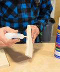 Person using SoloKit Instant Adhesive And Activator Set For Woodworking Bonds In Ten Seconds Cures To Four Thousand PSI In Thirty Seconds