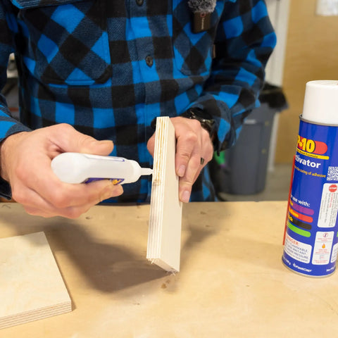 Person using SoloKit Instant Adhesive And Activator Set For Woodworking Bonds In Ten Seconds Cures To Four Thousand PSI In Thirty Seconds