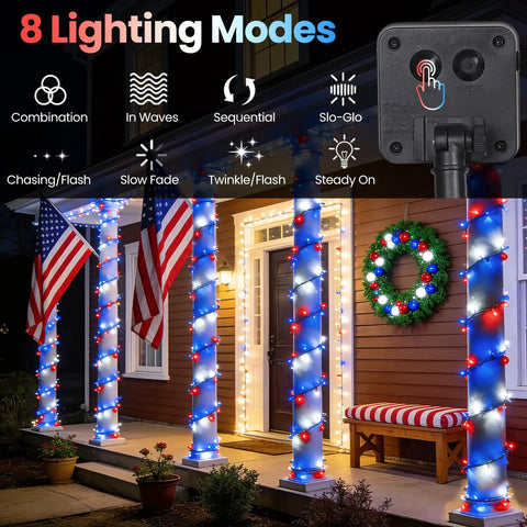 Solar Red White And Blue String Lights Outdoor Weatherproof For 4th Of July And Memorial Day Decor Lit For Garden Yard Path And Fence 100 LED Over 45 Feet Two Pack Of 50 LEDs 8 Modes wrapped around porch pillars with American flags and wreath.