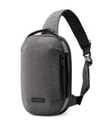 Lightweight 6L Crossbody Sling Bag For Travel And Everyday Carry, Anti Theft Pocket System, water bottle holder, gray compact design.
