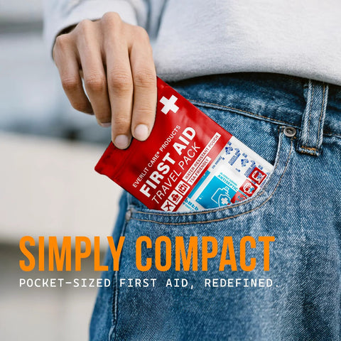 EVERLIT CARE First Aid Travel Pack, red pocket-sized kit; front-pocket view.