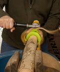 Person using Built Tough 3 Piece Die Cast Aluminum Tenon Cutter Set with lime green drill attachment on wood.