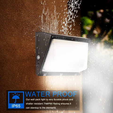 Dimmable 100W LED Wall Pack Light With Dusk to Dawn Photocell, mounted on a wall, water-resistant feature in action