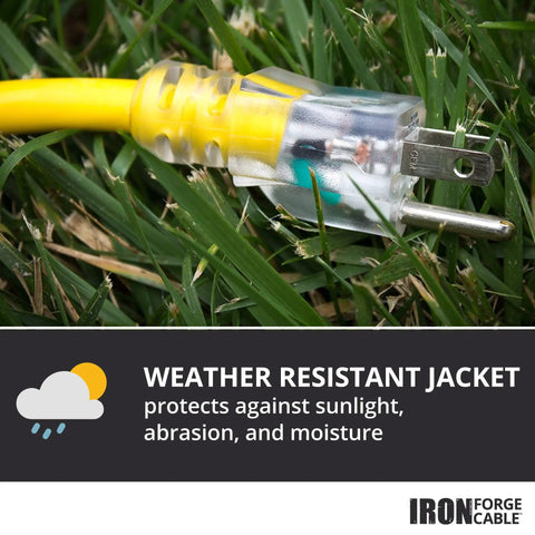 Lighted Outdoor GFCI Extension Cord With Three Outlets, 3 Foot 12 Gauge SJTW cable on grass with weather resistant label.