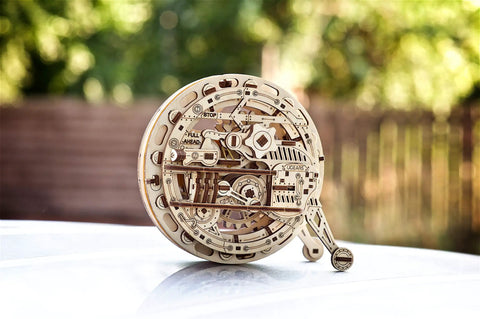 Mechanical Wooden 3D Puzzle Model Monowheel Construction Set For Gearhead Builders With A Steampunk Skeleton Showcasing Moving Dope Gears Durable Outdoor Ready So You Can Roll It On The Street Or Desk A Fun STEM Toy, wooden monowheel on table