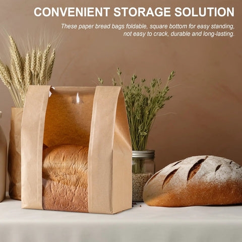Large Window Paper Bread Bags 25 Pack For Sourdough And Homemade Bread With Label Seal Stickers shown with bread inside.