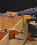 Top Shelf 18 Inch Parallel Clamps 2 Pack Woodworking Tools in use, applying even pressure on a wooden cabinet project.