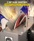 Heavy Duty 500W Bench Grinder Featuring 7 Inch Grinding Wheel For Sharpening Lawnmower Blades Knives And Scissors Adjustable 30 And 40 Degree Angles, sparks flying from blade sharpening.
