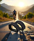 2 Pack Black Pedal Straps For Kids Bikes And Fixed Gear Durable Toe Clip Straps on road with cyclist in background at sunset