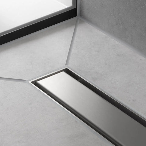 Professional Grade Rectangular Linear Shower Drain With Adjustable Height Frame And Brushed Stainless Steel Cover Tileable Bathroom Floor Grate For Zero Fuss 39 Inch Rough Install installed in a modern bathroom floor.