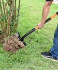 Man using Heavy Duty Digging Shovel With Trenching Blade And D Handle Fiberglass Grip For Yard Work on grass