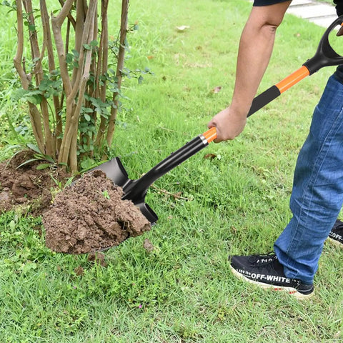 Man using Heavy Duty Digging Shovel With Trenching Blade And D Handle Fiberglass Grip For Yard Work on grass