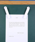 Magnetic Lock Key Set Of Three For Theft Prevention And Security Hooks And Boxes on a bulletin board with paper