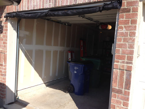 Open garage with the Durable 14 Ft By 7 Ft Garage Screen With Easy Pass Through Zippered Access Storage Kit Included No Hassle Setup.