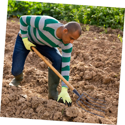 Man using Versatile Grass Fork For Farm And Garden, Durable Manure Forks Easy To Use For Grassland Cleanup, Lawn Care, Composting