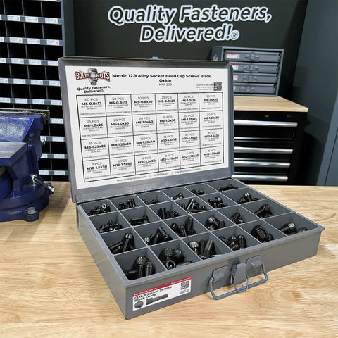 Pro-Grade 12.9 Alloy Allen Socket Head Cap Screws Kit With Black Oxide Finish, 453-Piece Set In 24-Hole Tray displayed on a table.