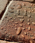 Pro Shop Grade Wet Look Concrete Sealer Five Gallon Solvent Based Styrene Acrylic Formula on wet paver surface.