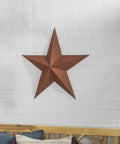 Kick Rust To The Curb Tough As Nails Oil Based Primer Spray Flat Brown on white brick wall as a decor accent.