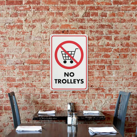 No Trolley Symbol 8 By 12 Warehouse Equipment Restriction Sign on brick wall in dining setting, rust-free aluminum plaque