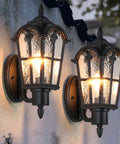 Heavy Hitter 16 Inch Large Outdoor Wall Light Fixtures Built Tough Exterior Metal Lantern Sconces Durable Weatherproof Porch Lamp For Garden Patio Backyard with clear glass panels on black wall.