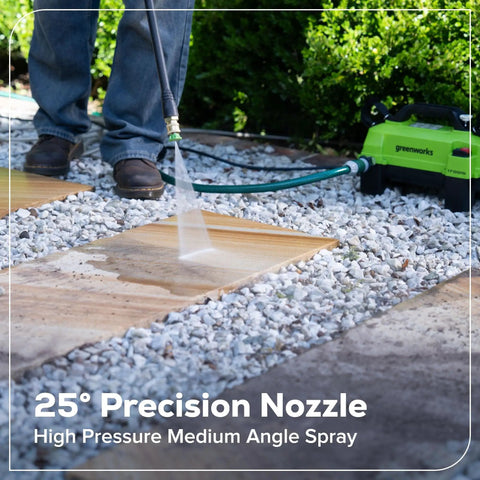 Using Ultra Compact 1700 PSI 1.2 GPM Pressure Washer for Quick No Fuss Home Cleaning on garden path with a precision nozzle