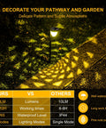 10 Pack Solar Pathway Lights Outdoor LED Garden Lights illuminating a garden path with warm white light and decorative pattern