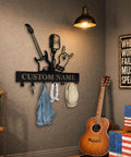 Personalized Guitar Key Holder For Wall With Custom Name, metal mount featuring guitar silhouette and hooks in home decor setting