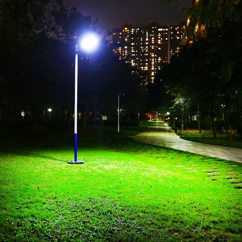Solar Powered Outdoor Street Light Dusk To Dawn With 3 Modes Motion Sensor 6000K illuminating a park pathway at night