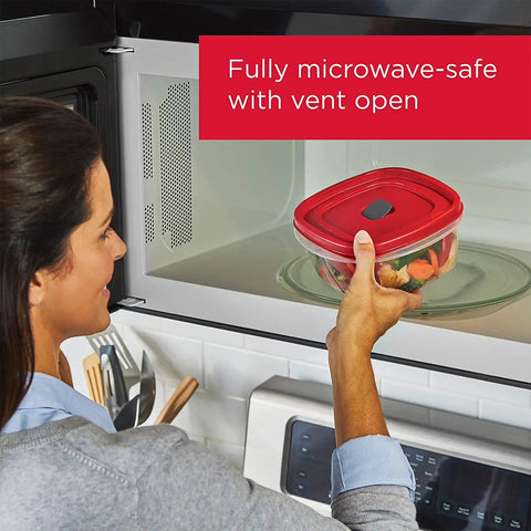 Person placing red-lidded container in microwave; 42 Piece Food Storage Containers With Lids Set For Kitchen Organization, BPA Free, Microwave Safe
