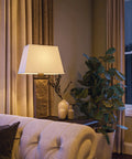Rustic Slate Table Lamp With Real Slate Column, 29 Inch Tall Farmhouse Vibe, lit in a cozy living room setting, next to sofa