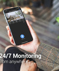 Person using phone app to monitor CapsuleCam Pro Baby Monitor 4 Pack 1080p HD WiFi Indoor Security Cameras