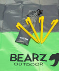 Lightweight Beach Tent Stakes Pack Of Four 5.9 Inch Sand Tarp Pegs With Anchor displayed on a green tarp
