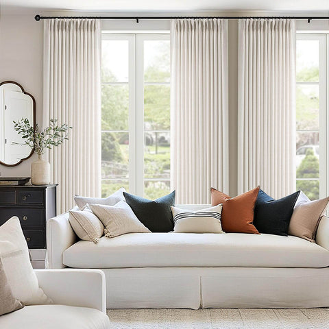 Pinch Pleated Linen Sheer Curtains 102 Inch Long, Two Panel Set With Ring Hooks And Clips For Track System in a living room setting.