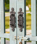 Two Piece Rustic Cast Iron Door Handle Set For Barn Doors Cabinets And Drawers Built Tough In Antique Black Finish installed on a gate