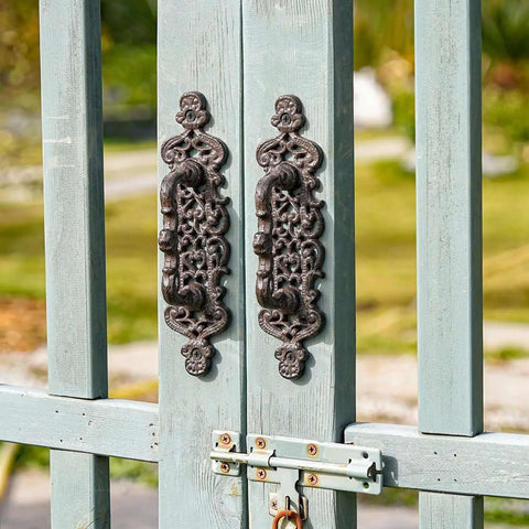 Two Piece Rustic Cast Iron Door Handle Set For Barn Doors Cabinets And Drawers Built Tough In Antique Black Finish installed on a gate