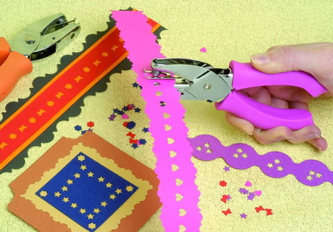 Heart Shape Craft Hole Punch Handheld Paper Punch One Quarter Inch With Cushioned Grip for Scrapbooking projects in use
