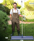 Man holding Leveling Rake With Beefy Aluminum Roller And Stainless Steel Core, 40 By 10 Inch Heavy Duty Lawn Tool, Blue
