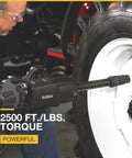 Man using Heavy-Duty Air Impact Wrench With 8 Inch Anvil And D-Handle on large vehicle tire