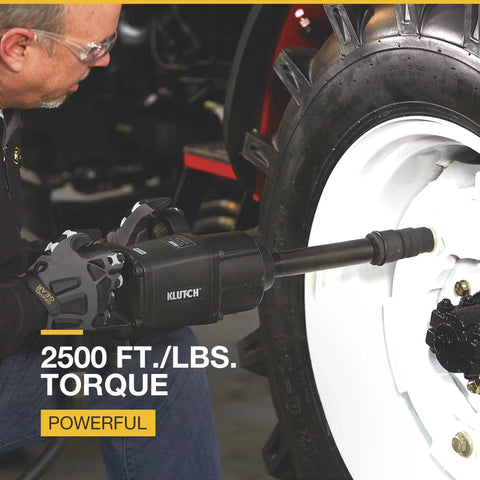 Man using Heavy-Duty Air Impact Wrench With 8 Inch Anvil And D-Handle on large vehicle tire