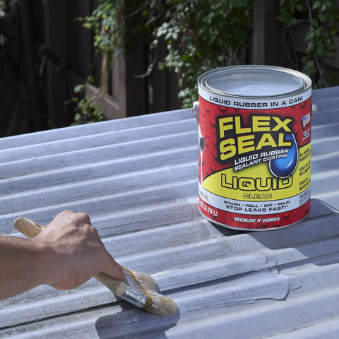 Hand applying Liquid Rubber Coating Sealant For Waterproof, Flexible, UV Resistant Protection on metal roof, 1 gallon can.