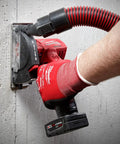 Milwaukee 12V cordless cut-off tool (bare tool) side view with red body and dust hose