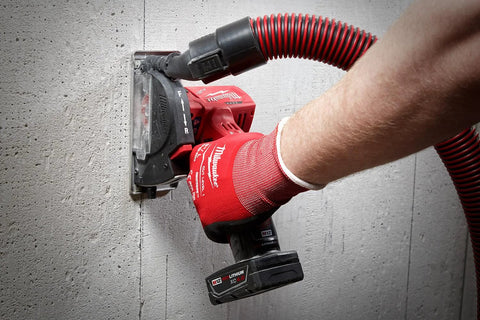 Milwaukee 12V cordless cut-off tool (bare tool) side view with red body and dust hose