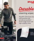Man using L30 Heavy Duty Cleaning Cloths Wipes With Cloth Like Soft Feel And Tough On Grime Absorbency White Pop Up Box 720 Sheets