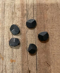 1 Inch Wrought Rose Head Nails Set Old School Hand Forged Antique Style Nails With Black Oxide Finish 25 Count For Restoration Projects And Vintage Furniture Decorative Hardware on wooden surface.